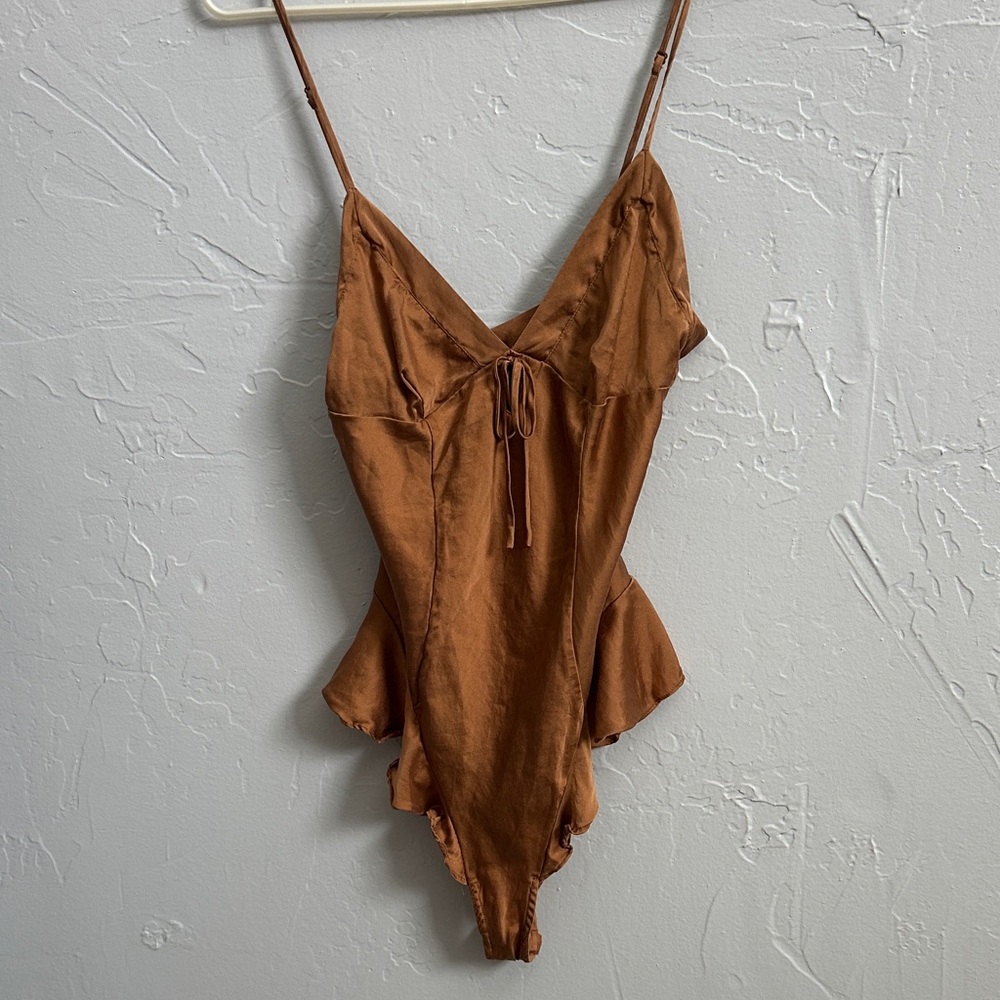 SKIMS Brown Ruffle TEDDY. Size Small. Adjustable straps, bottom closure.